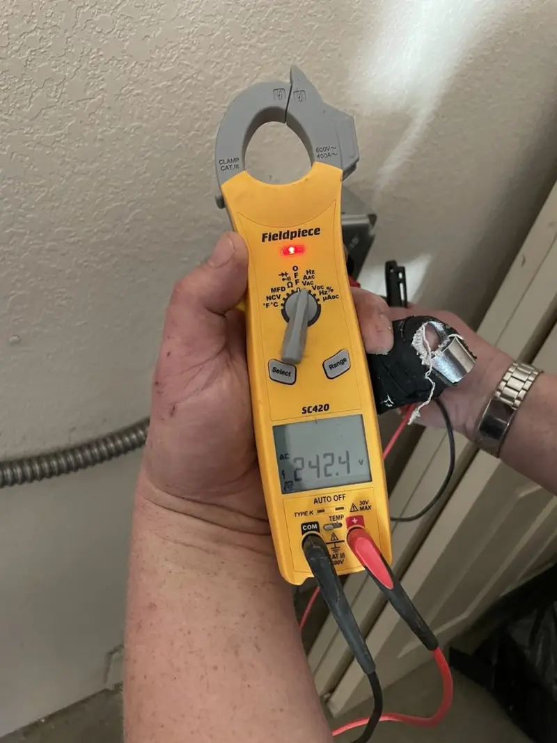 Voltage testing with clamp meter during Generator Installation in Port Aransas